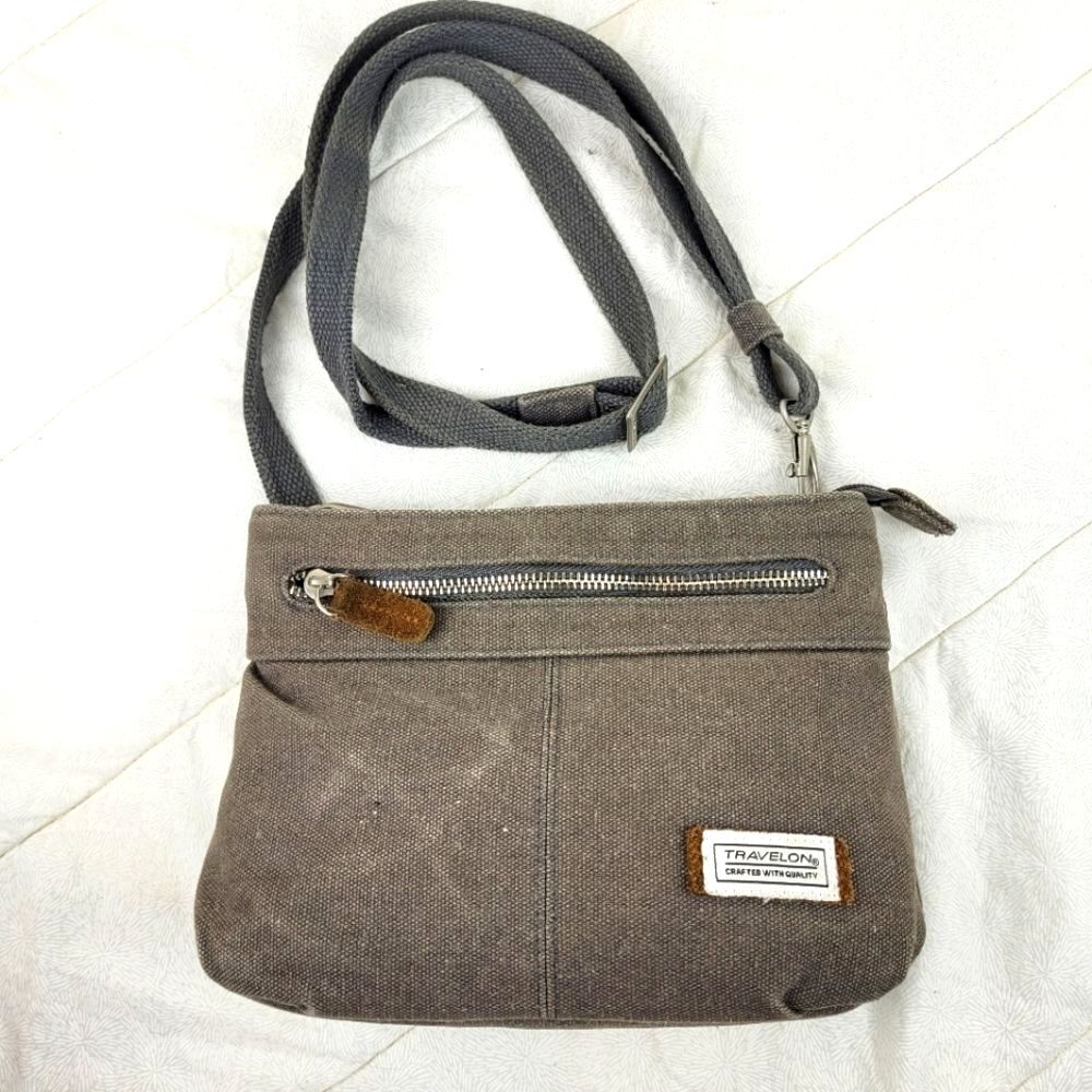 Travelon olive canvas crossbody bag suede tabs interior trim adjustable strap